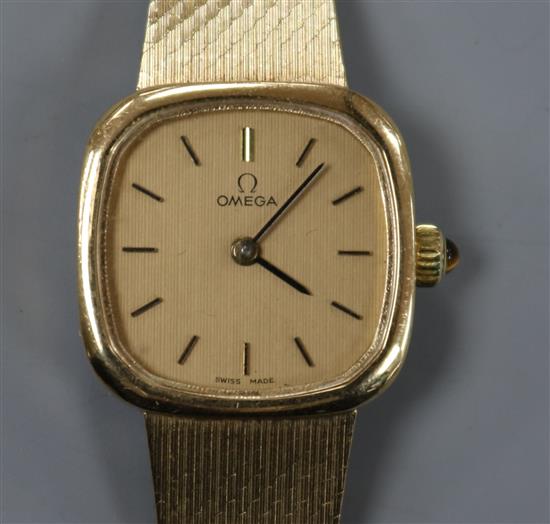 A ladys 9ct gold Omega wristwatch on mesh bracelet.